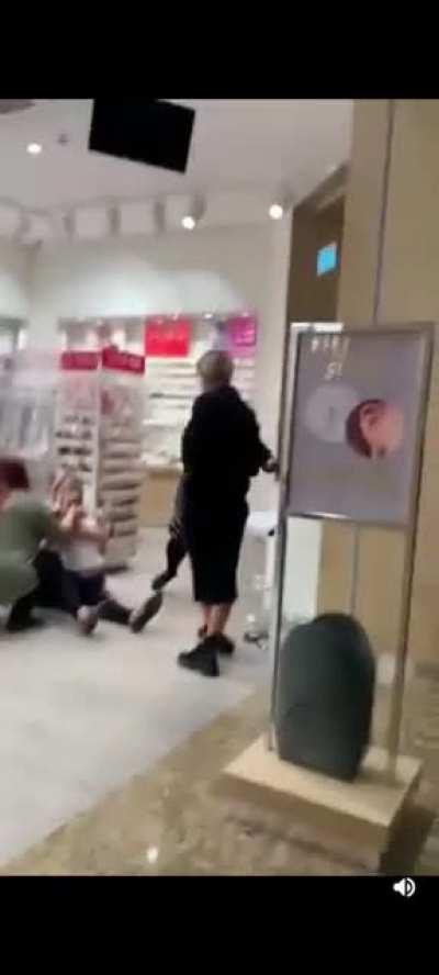 3 adults physically restrain a screaming child to pierce her ears