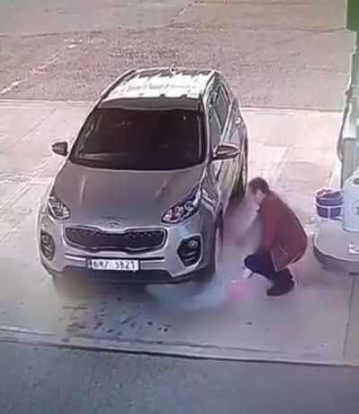 To fill up his tire using a Fire extinguisher 