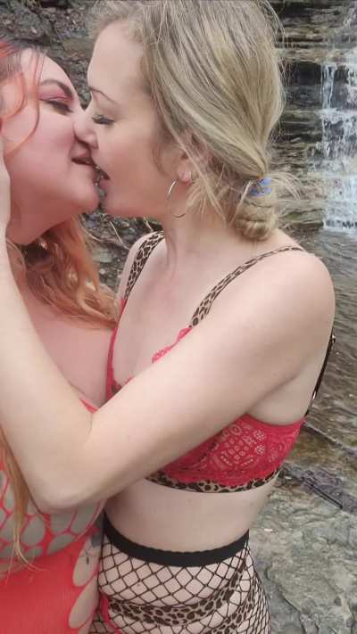 Kissing this beauty by a waterfall on a foggy afternoon