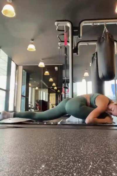 Stretching in tight leggings