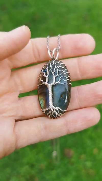 A tree pendant I made with a labradorite gemstone :).