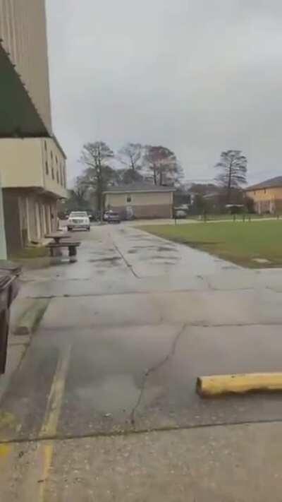 Hotline! Ball of electricity shoots across a frozen power line during the savage winter storms across the south.