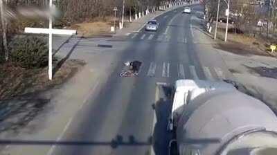 Truck side swipes cyclist