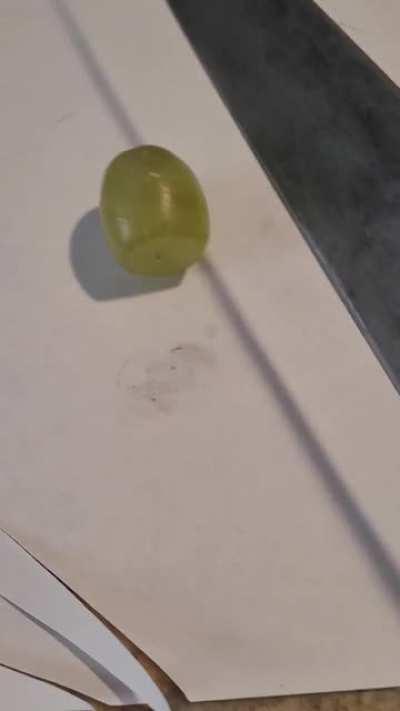 Me attempting to cut a grape after sharpening 😎