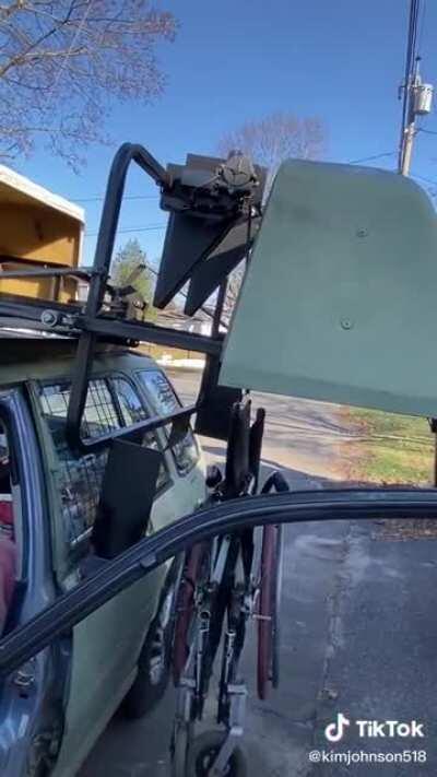 Wheel chair crane for car storage