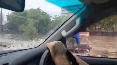 Ex-Cricketer Wahab Riaz, splashing bikers on the flooded streets of Lahore.