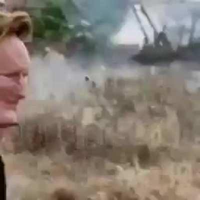 Conan Obrien eating fried chicken then crashing his car