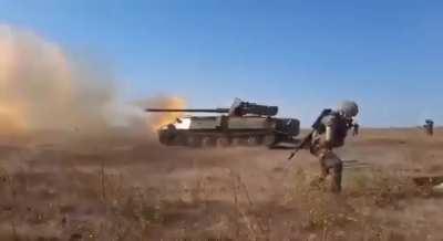 Ukrainian Transporter I-can-only-get-so-Erector Loader (MT-12 antitank gun strapped to an MT-LB )