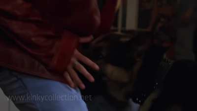 Girls watch and laugh as a dog bites a guy's balls in Trojan War 1997