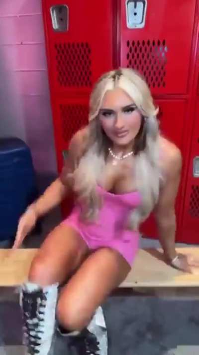 Tiffany Stratton in a tight pink outfit