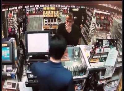 Cop pulls a gun on a man because he thought he was stealing sweets