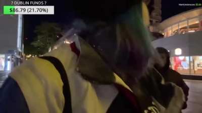 A woman is walking in the evening through Rotterdam and gets spat on, after which she gives the guy a smack in the face