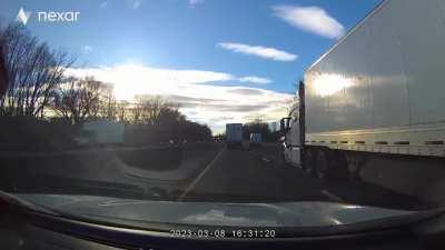 18 wheeler merges into left lane without looking, runs me into the shoulder. Did I do the right thing in this situation?