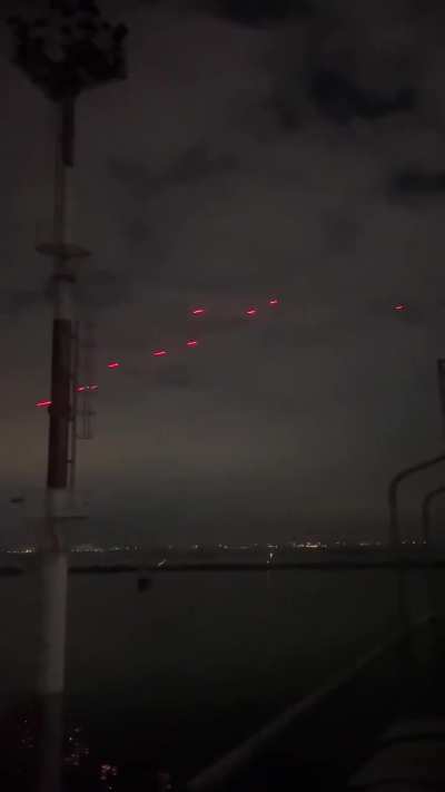 Ukrainian anti-aircraft guns shooting at incoming Russian Shahed-136 drones over Odessa