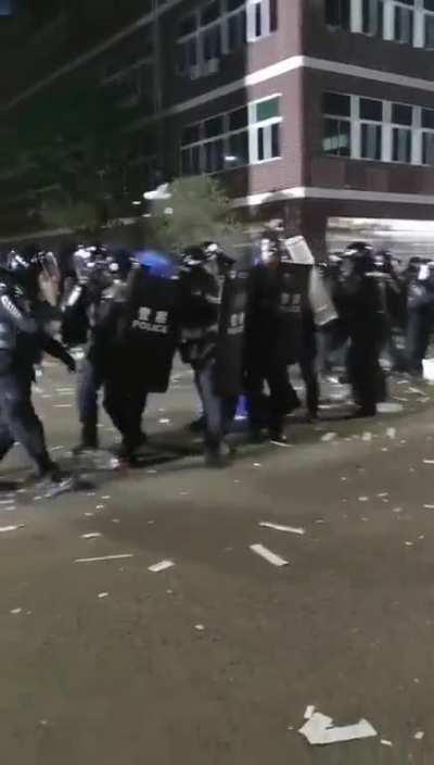 Workers from Zybio Pharmaceuticals factory in Dadukou district, Chongqing protesting against unlawful layoffs, police sent in to break the protests but are pushed back