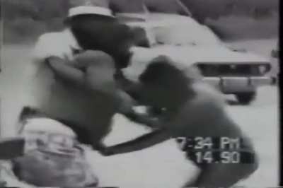 Woman strips naked before fighting with another woman -Arkansas, 1990.