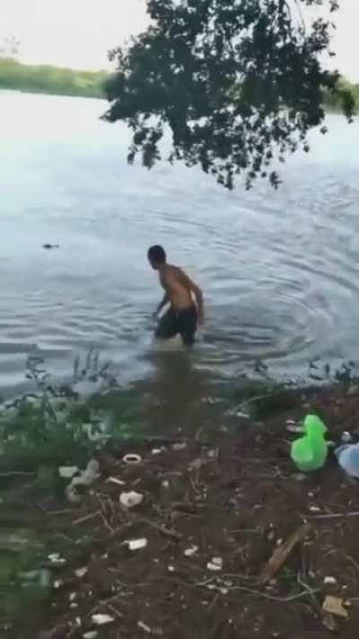 Swimming in Caiman laden waters.