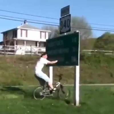 WCGW cycling face first into a sign