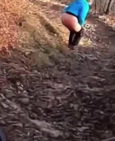 Guy taking a fucking shit in the middle of a bike path