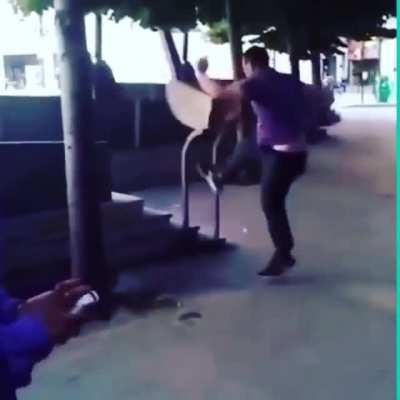 Idiot fights trashcan