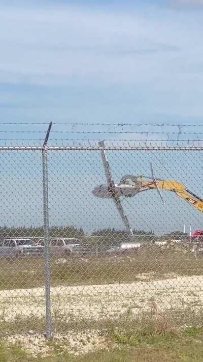 Excavator operator playing with a scrapped plane! 😂