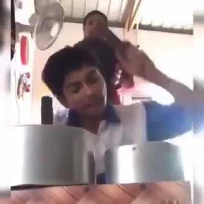 Behind all that headache is a kid who is so done with this song.