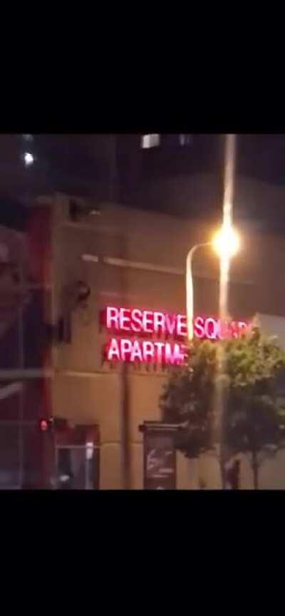 Man parachuting in Downtown Cleveland