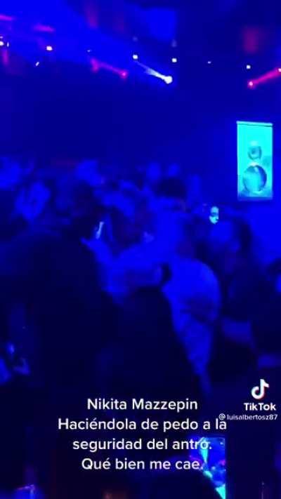 Mazepin getting escorted out of a night club in Mexico.