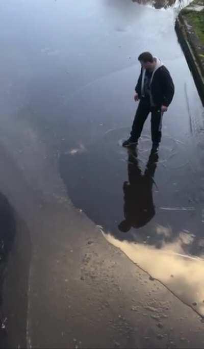 Scottish Man tries to cross frozen canal…