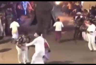 Riding an elephant to a wedding