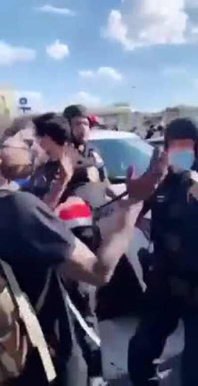 NYPD pull down mask and pepper spray protester who had hands up