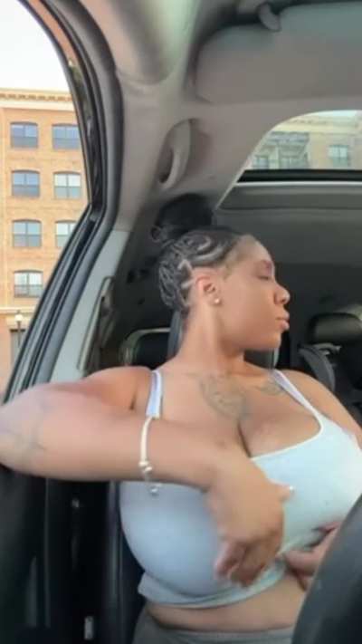 Ebony chick showing her huge natural titties