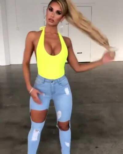 Neon yellow one piece and (very) tight jeans