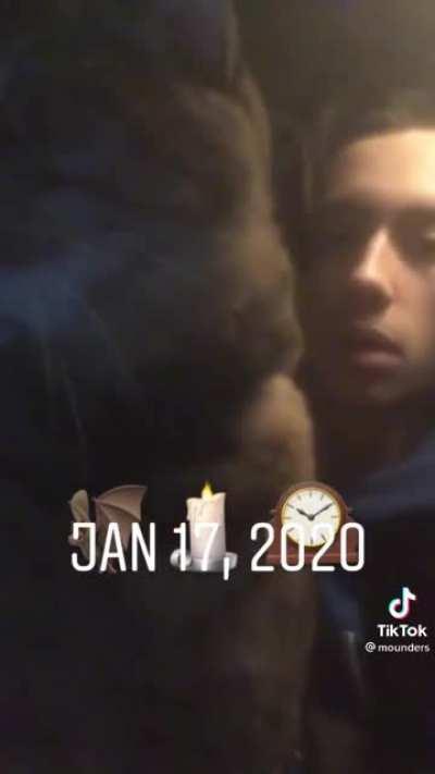 Ghost mountain petting his cat