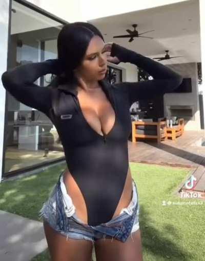 Black bodysuit & jean shorts