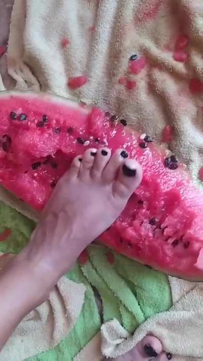 The sensation between my fingers and the freshness of the watermelon.