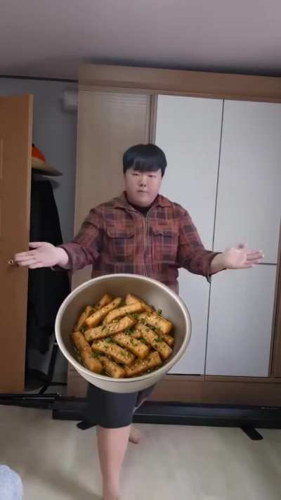 guy “dancing” his way through making skewers