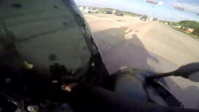 Motorbike rider survives three-way crash with a red light runner