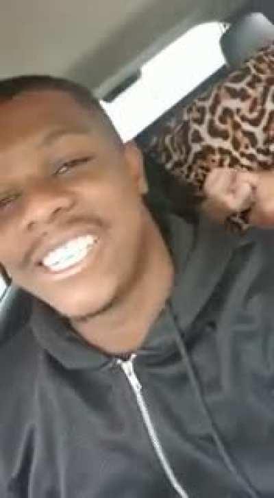 Two girls fighting each other and the coolest uber driver filming.