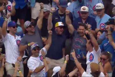 Anthony Rizzo sits in the bleachers at Wrigley Field, being honored for his retirement, almost catches the first home run of the game.