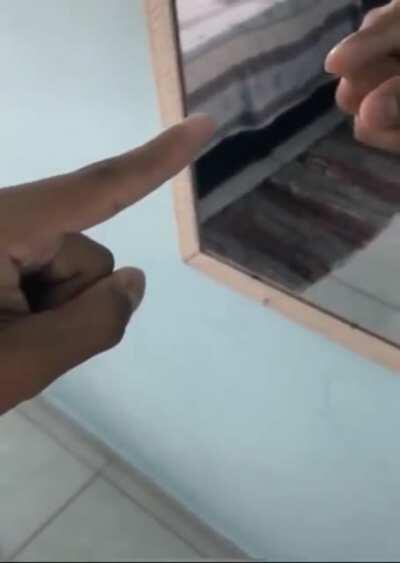 Just a guy playing with a mirror