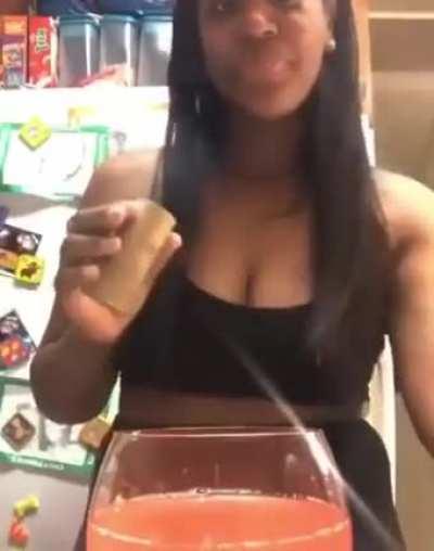 Trying to drink using a toilet paper roll as a giant straw