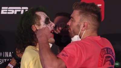 A UFC fighter tries to intimidate his opponent with Joker makeup