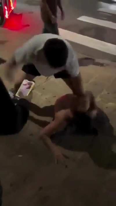 Guy in white tried to walk away, but other dude kept following him, so bro put him in a coma.