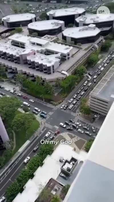 Cars jammed Waikiki streets in Hawaii as residents and visitors scrambled to escape a tsunami warning following a magnitude 8.8 earthquake off Russia.