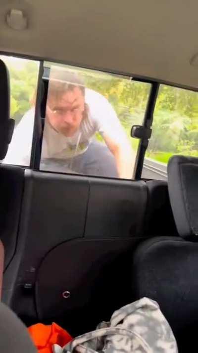 Father / Agent Sanderson pulls his son over.