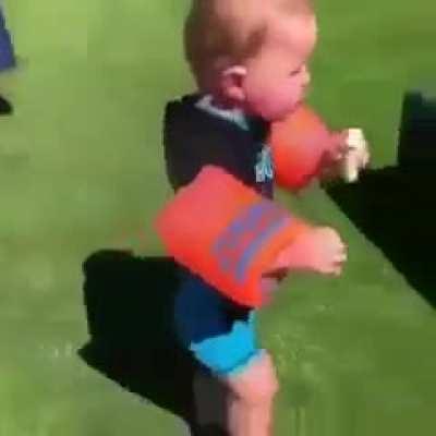 Little guy can't eat his banana