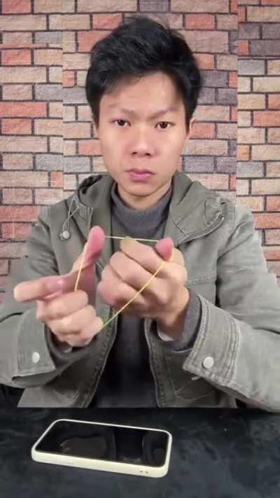 Learn the Rubber Band Magic Trick