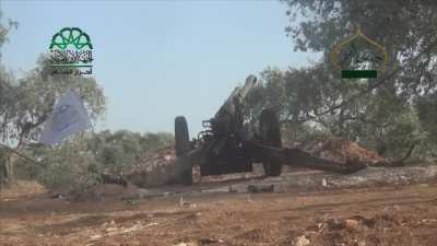Syrian rebels (Jaish al Fateh coalition) using a rare WW2 era German howitzer 10.5 cm leFH 18M. Firing towards the Ariha area, Idlib. Video posted 17th May 2015.