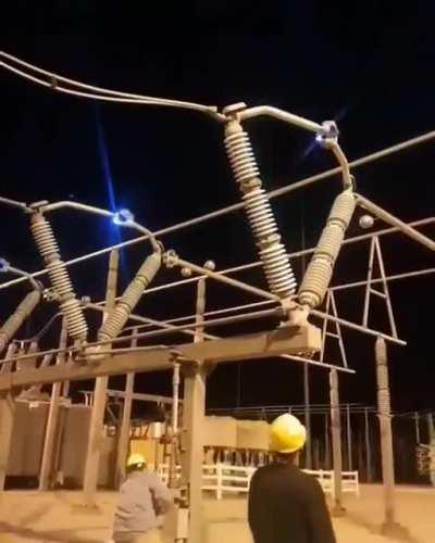 Closing a 345KV disconnect.